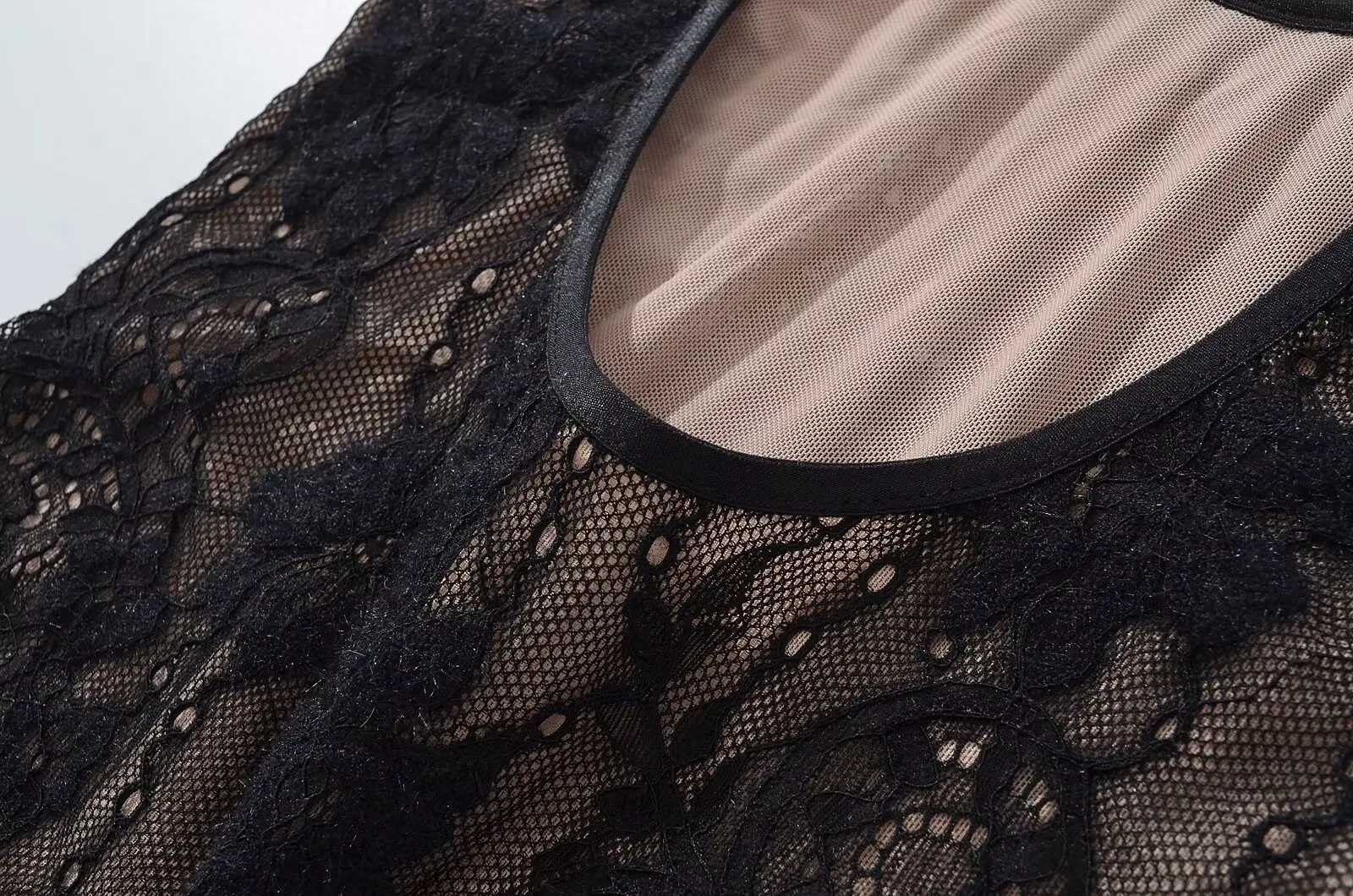 moteriški seksuali kombinė